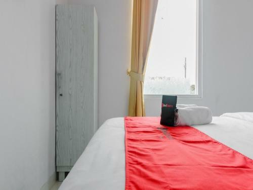 Hostal Reddoorz Plus Near Taman Rasuna Menteng