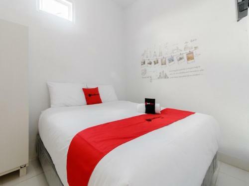 Hostal Reddoorz Plus Near Taman Rasuna Menteng