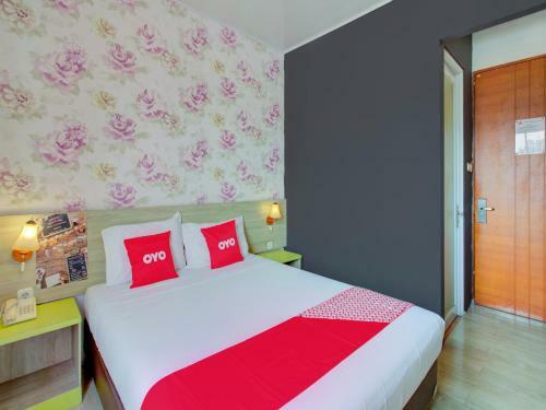 Capital O 4002 Aleander Hotel