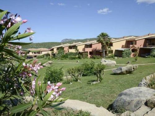 Lovely Holiday Home In Marinella With Shared Garden