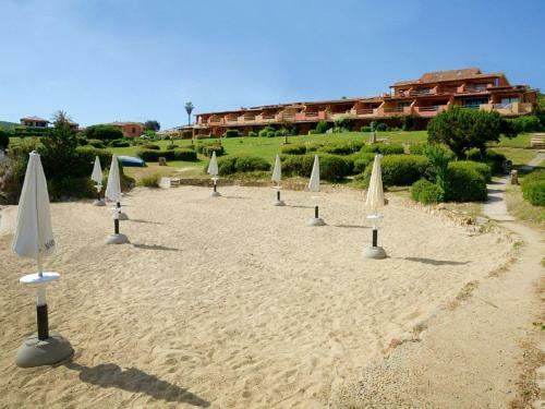 Lovely Holiday Home In Marinella With Shared Garden