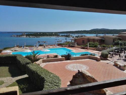 Lovely Holiday Home In Marinella With Shared Garden