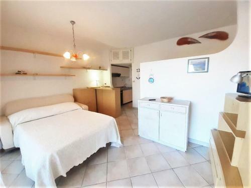 Alluring Holiday Home In Marinella With Shared Garden