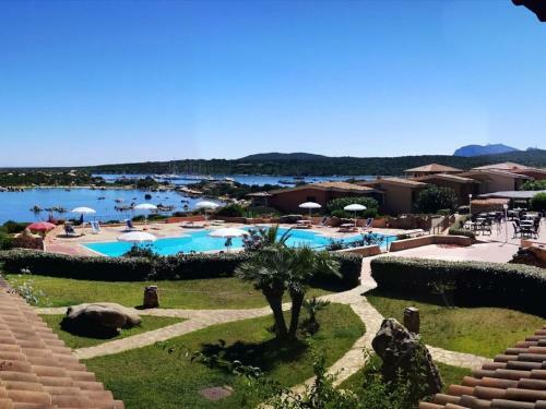 Alluring Holiday Home In Marinella With Shared Garden