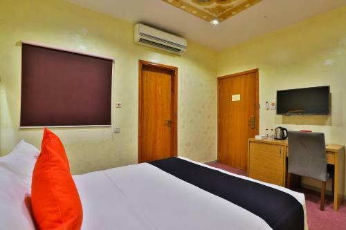 Capital O 338 Asian Hotel