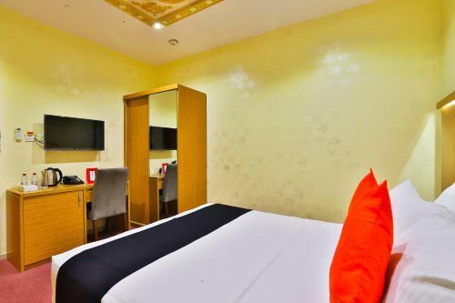 Capital O 338 Asian Hotel