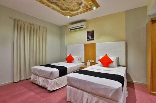 Capital O 338 Asian Hotel