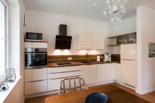 Apartamentos 5 Sterne Ferienwohnungen Am See