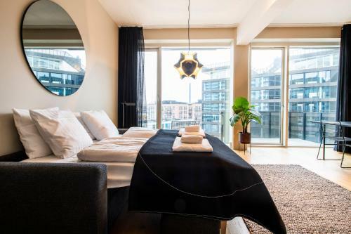By The Pier Apartments - Into This Place