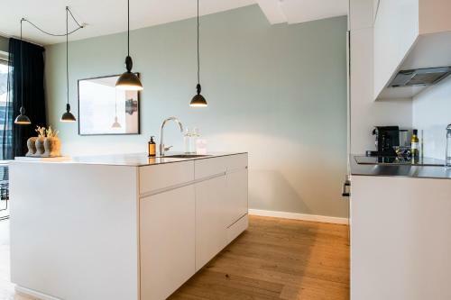 By The Pier Apartments - Into This Place