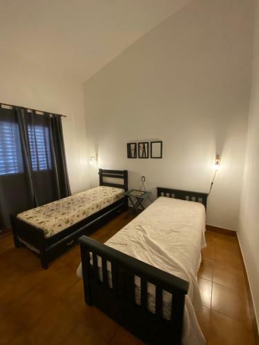 Casa De UNA Planta Con Patio Y Cochera