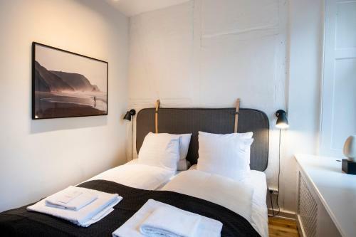 By Town Hall Apartments - Into This Place