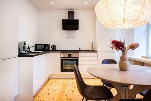 By Town Hall Apartments - Into This Place