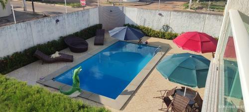 Casa Confort�vel, Pr�ximo A Praia, Ar Condicionado, Piscina.