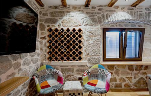 Nice Home In Kaprije With Jacuzzi, Wifi And 4 Bedrooms