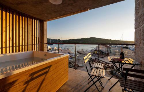 Nice Home In Kaprije With Jacuzzi, Wifi And 4 Bedrooms