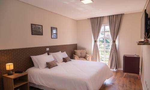 Hostal Village De Charme