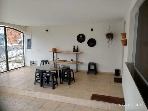 Posada Casa 230 - Pousada & Hostel