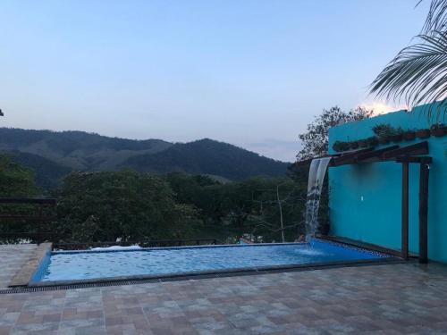 Hostal Aconchego Su�tes