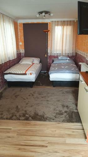 �denkert Apartmanh�z