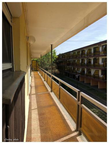 �va Apartman, Helikon-liget