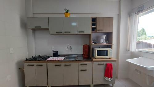 Apartamento Na Avenida Principal Com Garagem