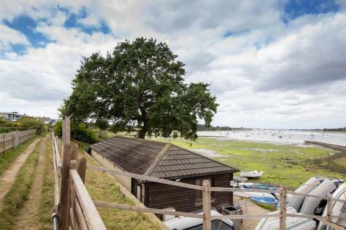 Luxury Riverfront Retreat With Garden And Heated Pool
