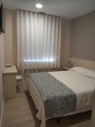 Hostal La Puerta De Arz�a
