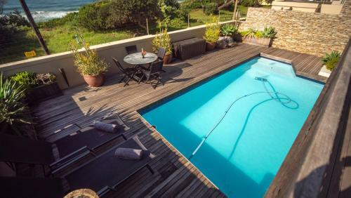 4 Dolphin Views, La Mercy Luxury Beachfront Apartmnet