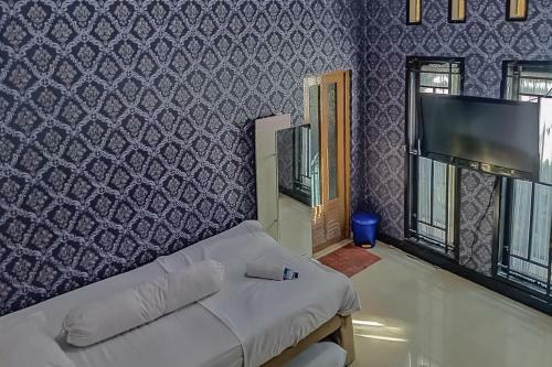 Hotel Boss Residence Serang Redpartner