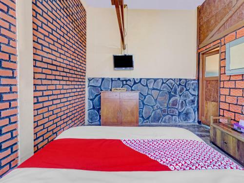 Oyo 90582 Nur Alam Hotel