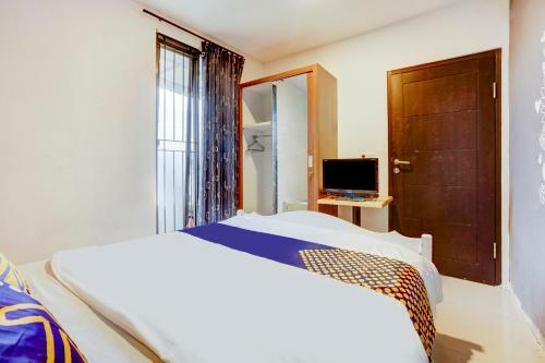 Hotel Spot On 90686 Griyapram Backpacker Syariah