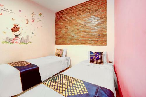 Hotel Spot On 90686 Griyapram Backpacker Syariah