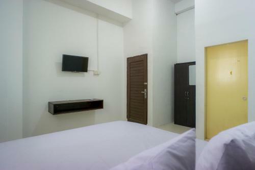 Hotel Oyo Life 2366 Gatsu Kost