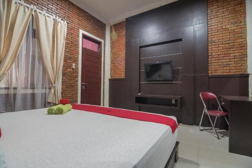 Hostal Reddoorz Plus Near Cambridge City Square 2
