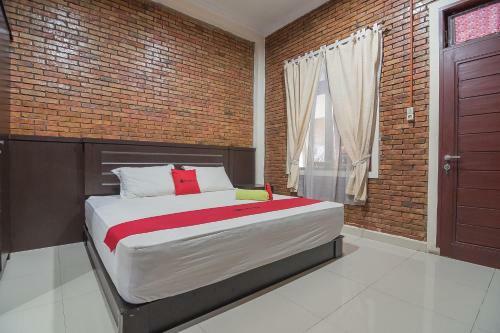 Hostal Reddoorz Plus Near Cambridge City Square 2