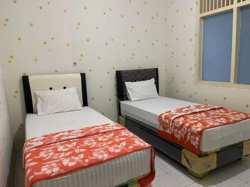 Hotel Oyo 90812 Hayza Residence Syariah