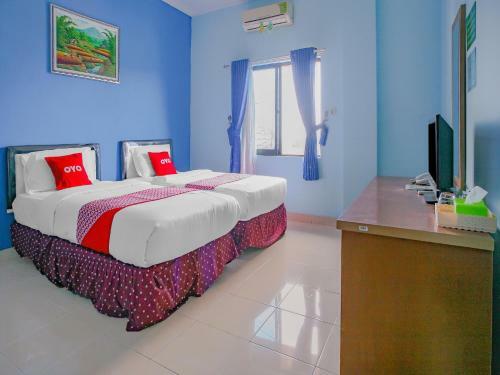 Hotel Oyo 90072 Apri Inn Syariah