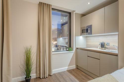 Aparthotel Dwell City Living