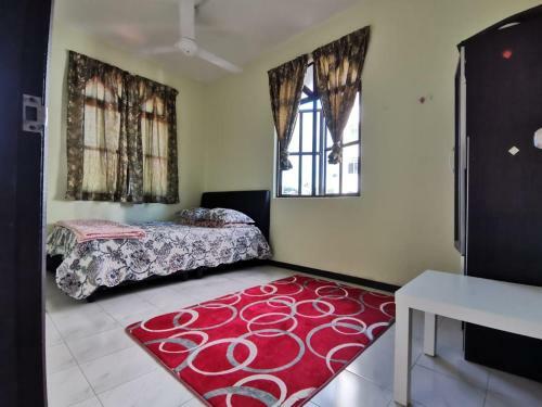 Apartamento Rizqee Homestay
