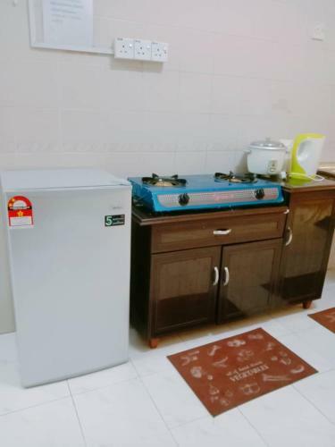 Apartamento Rizqee Homestay