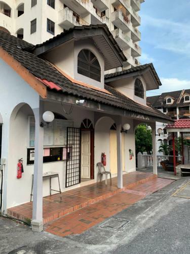 Apartamento Rizqee Homestay