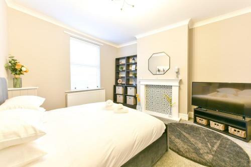 Apartamento Breathtaking 4 Bedroom House - Free Parking
