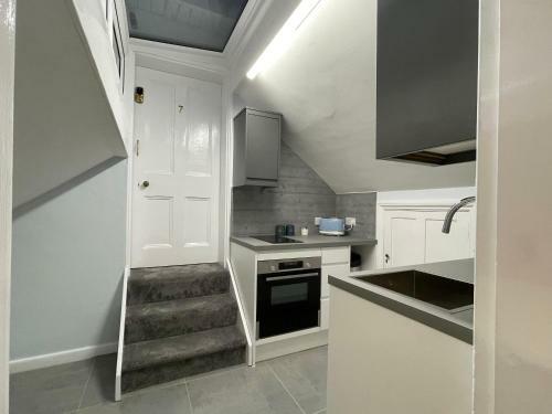 Apartamentos Ashbys Deluxe Studios