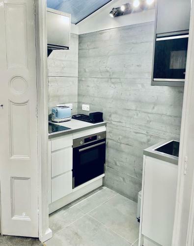 Apartamentos Ashbys Deluxe Studios