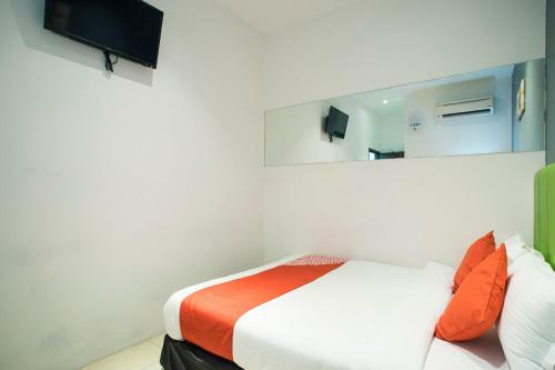 Oyo 1003 Rich Calton Hotel