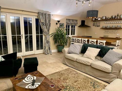 Apartamento Walnut Tree Cottage Barn