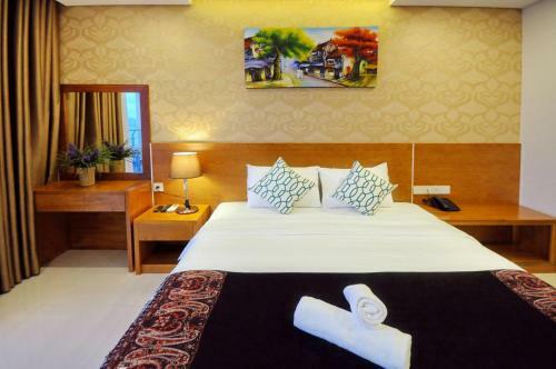 C?n H? Cao C?p View Bi?n Maple Hotel And Apartment