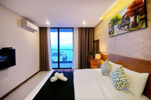 C?n H? Cao C?p View Bi?n Maple Hotel And Apartment
