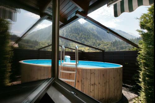 Chalet Sabrina Mit Au�enpool Im Sommer